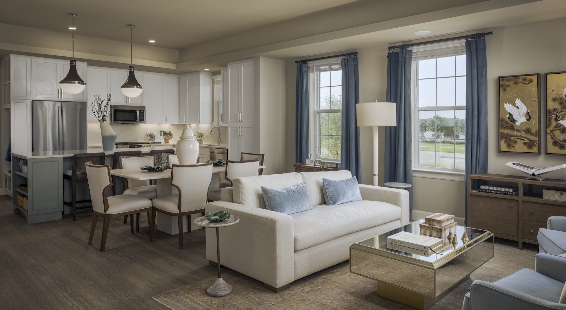 living room with furniture and view of a kitchen