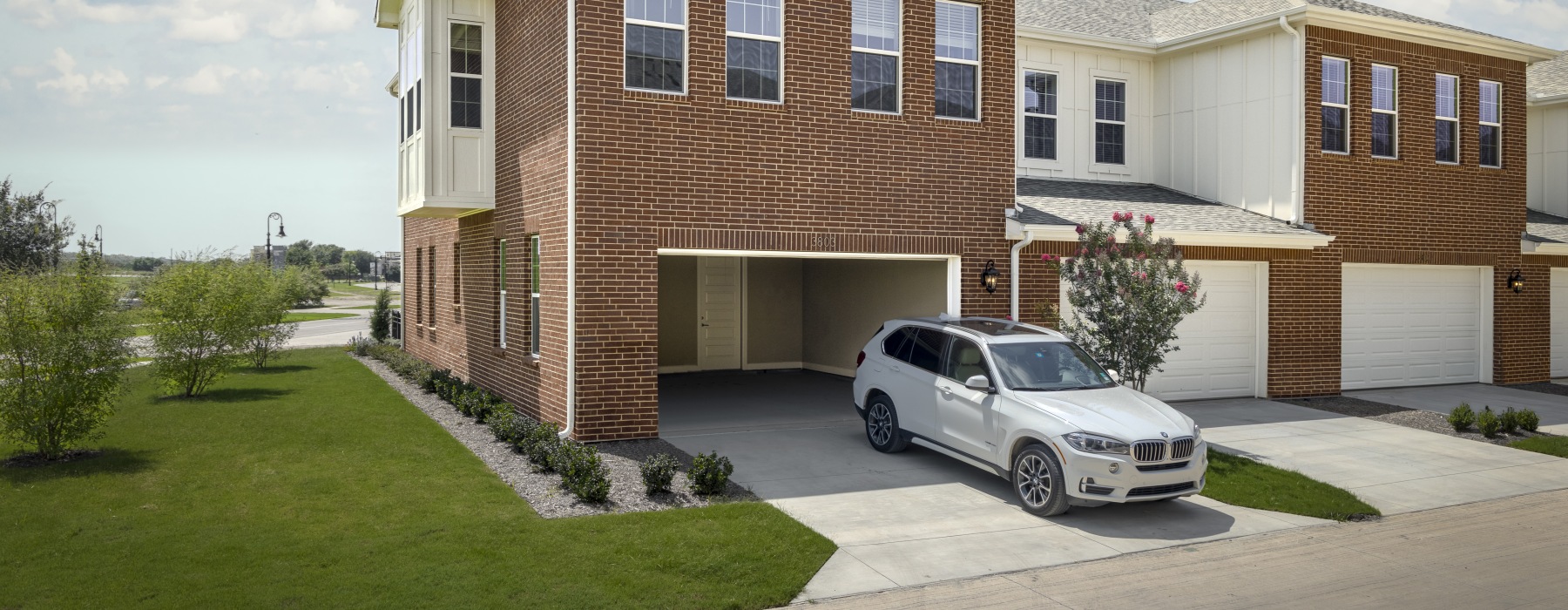 Rendering of townhome with a two-car garage