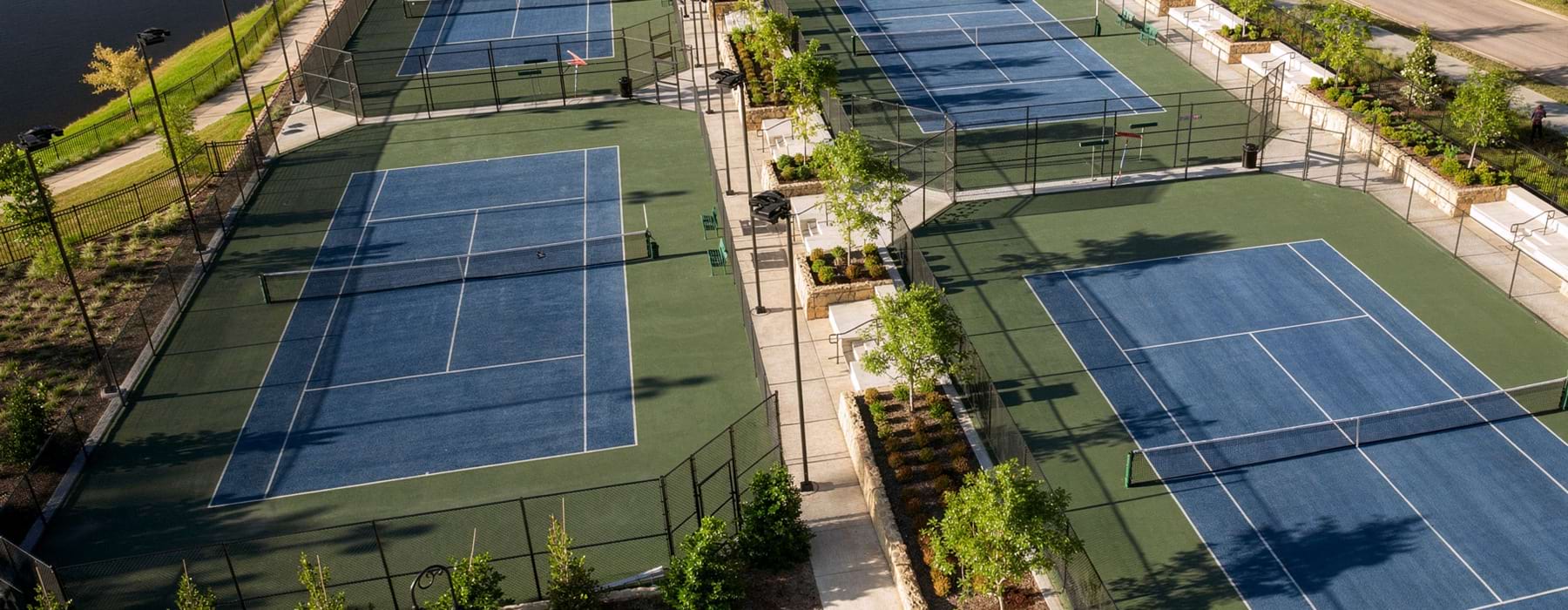 Aerial view of 4 tennis courts